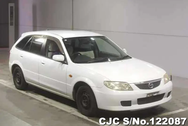 2003 Mazda / Familia Stock No. 122087