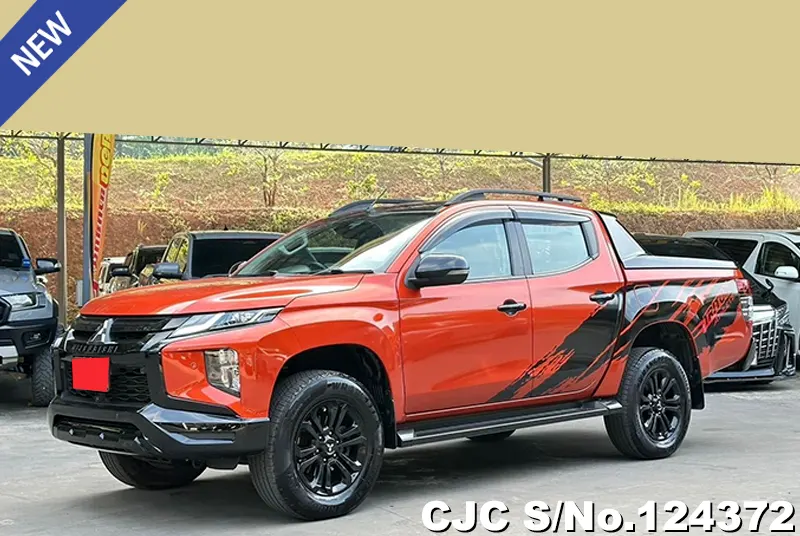 Mitsubishi Triton in Orange for Sale Image 0