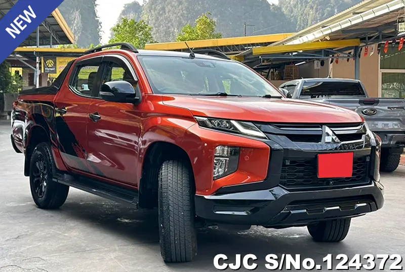 Mitsubishi Triton in Orange for Sale Image 1