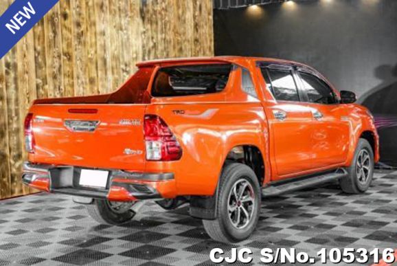 Toyota Hilux in Orange for Sale Image 1