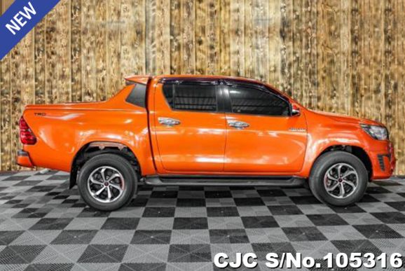 Toyota Hilux in Orange for Sale Image 4