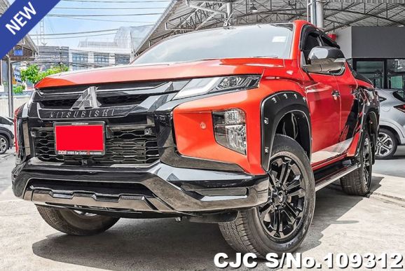 Mitsubishi Triton in Orange for Sale Image 0